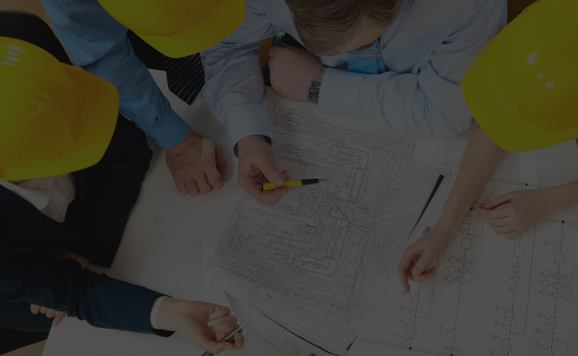 Contractors Discussing Building Plans